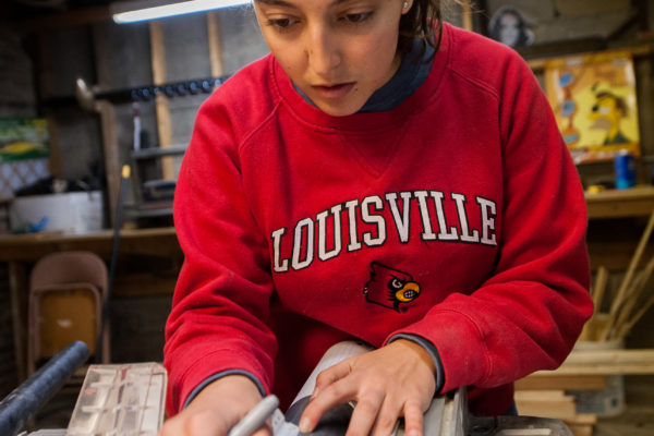 Emily Robison of River City Rocketry working to build the prototype, sub-scale rocket for the 2013-2014 NASA Student Launch competition representing the University of Louisville on 1-18-14 at LVL 1 Hackerspace in Louisville, Kentucky.